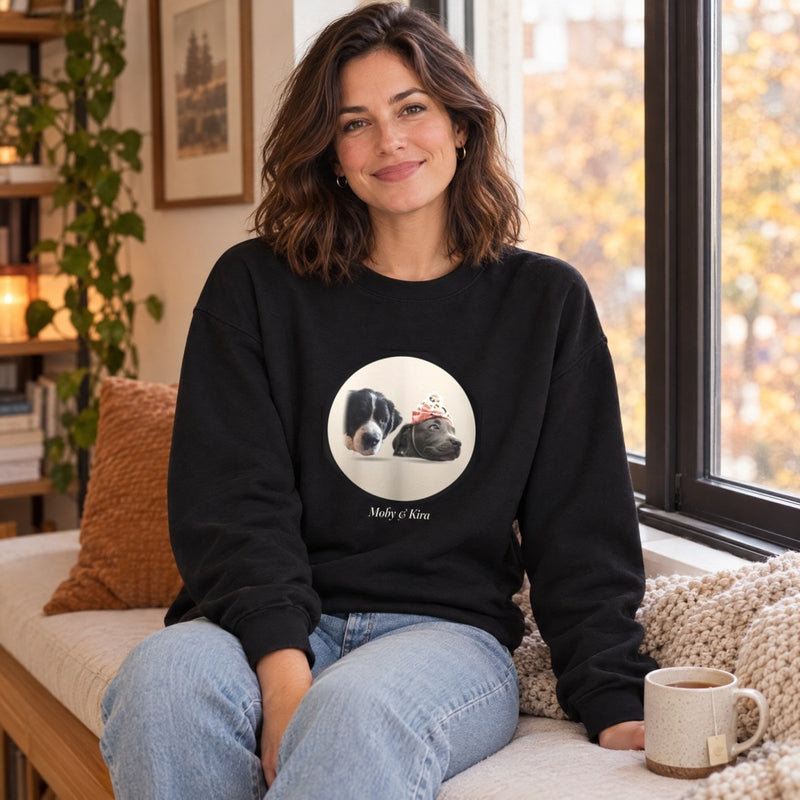 Lifestyle mockup: The Studio Crewneck worn by a window seat, with our sample portrait