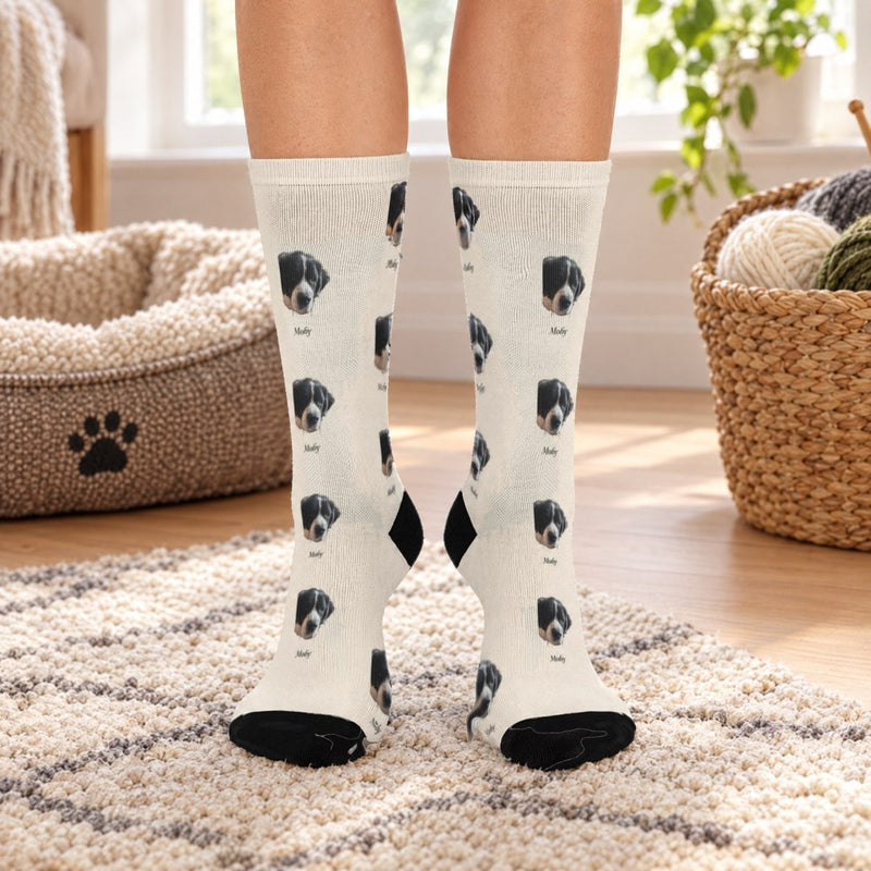 Lifestyle mockup: The Studio Socks worn on a cozy rug, with our sample portrait